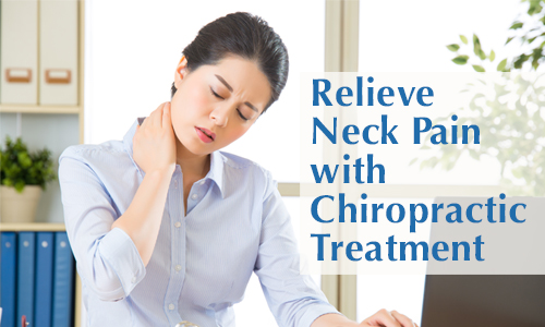 Image of lady holding her neck with neck pain